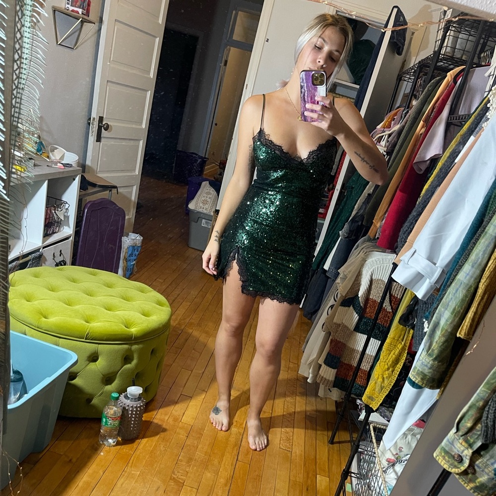 Black and green sequin mini dress.
